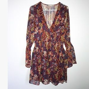 NWOT boutique floral dress with flare sleeves